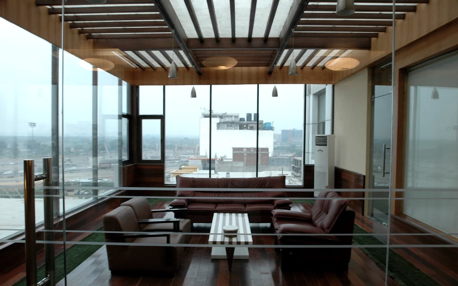 Editorial image for "The Nomad Family Office: What It Is and What It Definitely Is Not". Source image: Educomp Meeting Room.