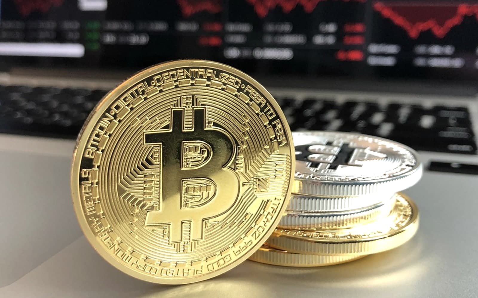 Editorial image for "Why "I'm Just Holding" Is Not a Wealth Plan". Source image: Gold and Silver Bitcoins - Credit to http://homedust.com/.